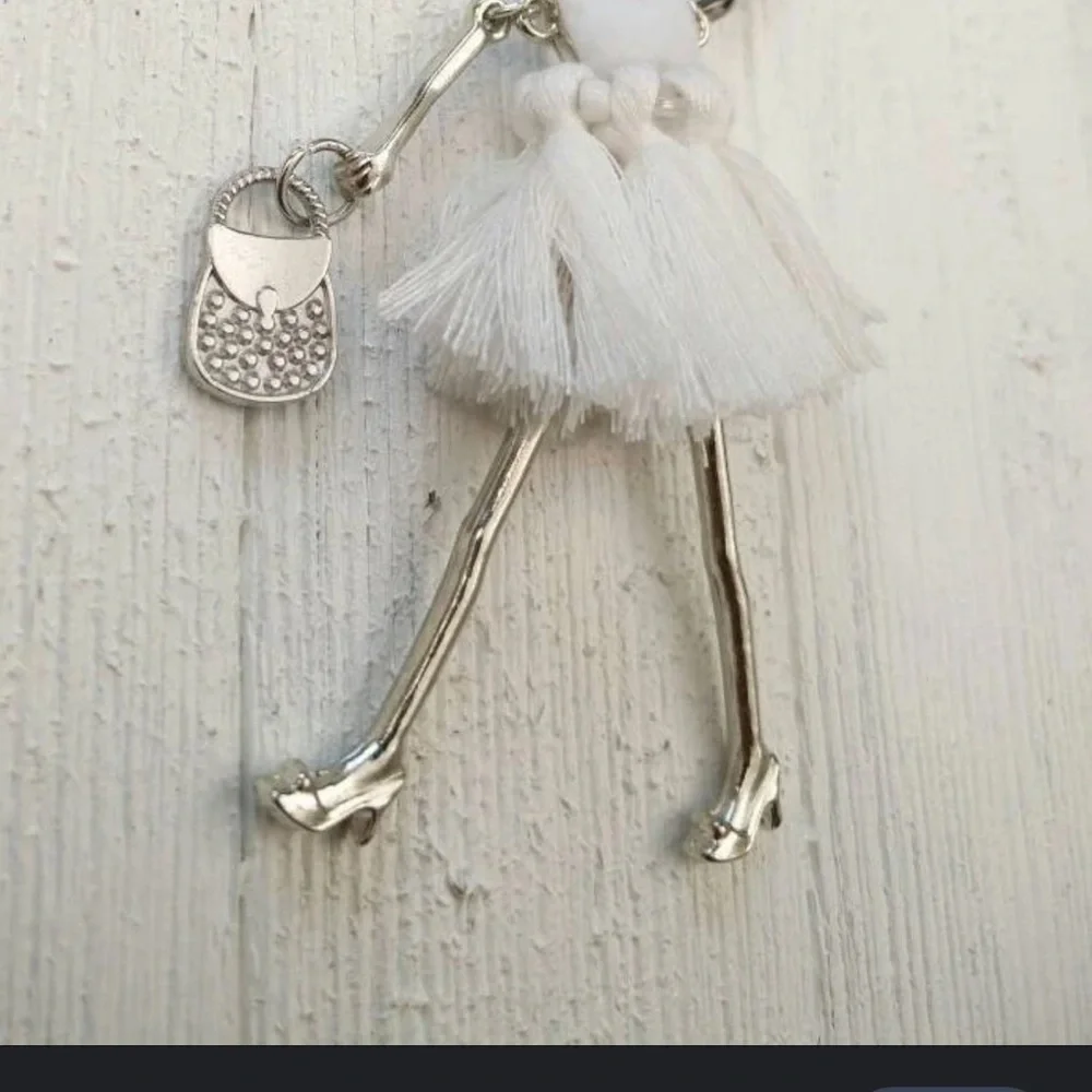 Jolees laliberi doll pendant